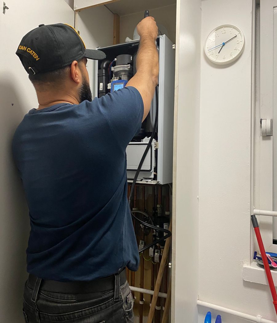 RIGP engineer working on an open boiler during a service